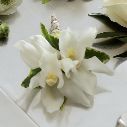 White Mini Cymbidium Boutonniere – KIEFER'S FLORIST, Coshocton OH
